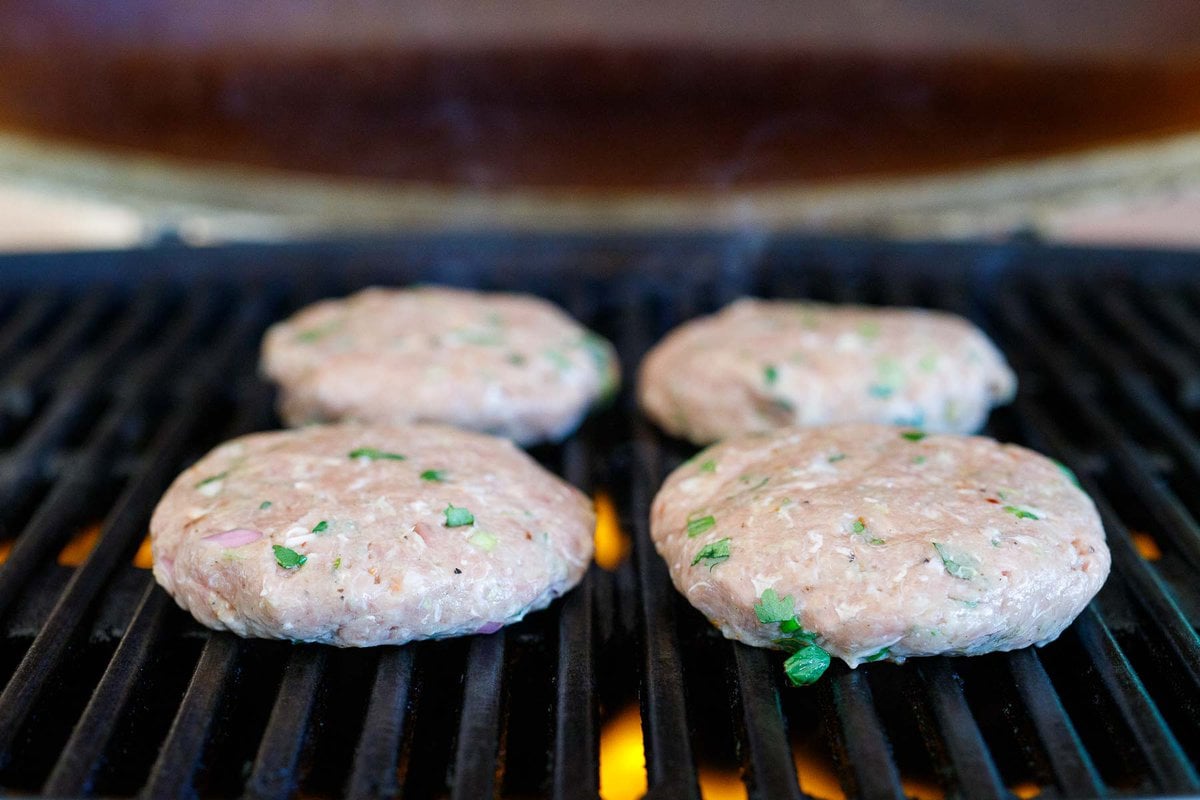 grilling the turkey burgers. 