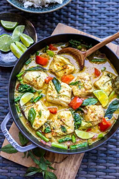 This Thai Fish Curry recipe is bursting with Thai flavors! Made with coconut milk, fresh fish and seasonal veggies. Fast, easy and healthy!