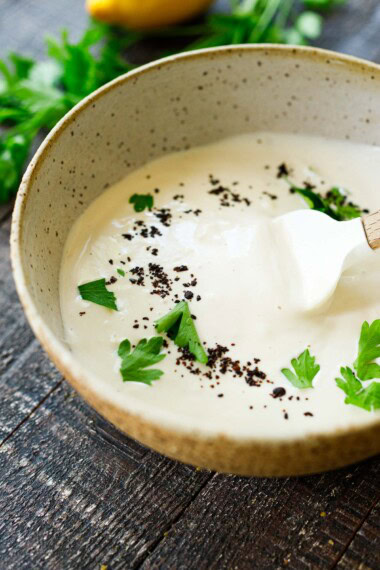 This Tahini Yogurt Sauce recipe is rich, creamy, and tangy—perfect for falafel, shawarma, cauliflower, or simply served as a dressing or dip. Vegan-adaptable.